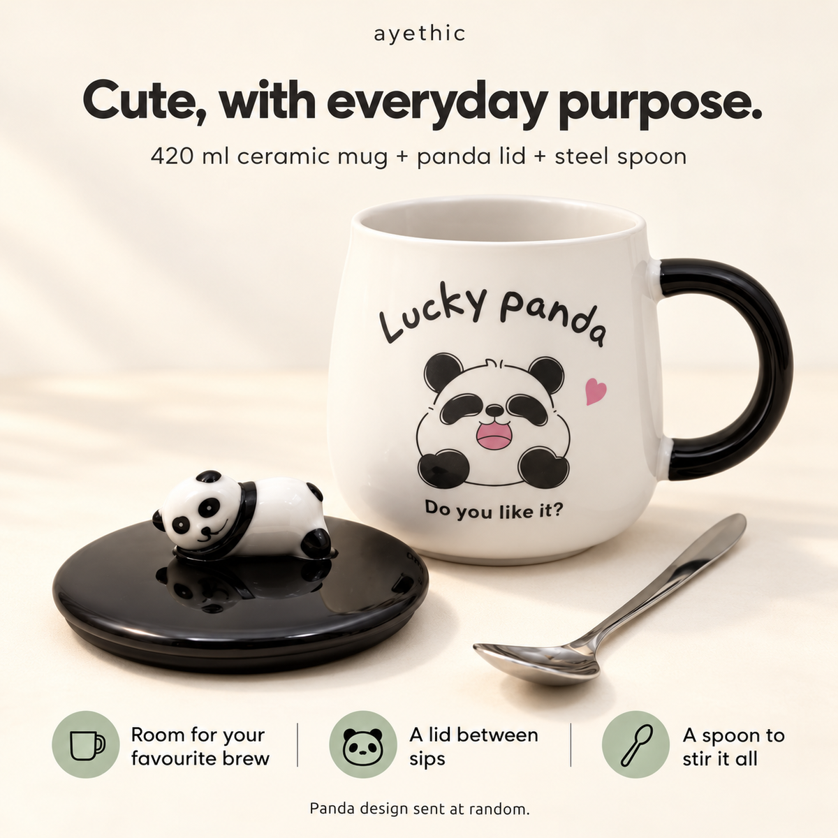 420 ml Fortune Panda ceramic mug with included panda lid and stainless steel spoon, showing everyday features.
