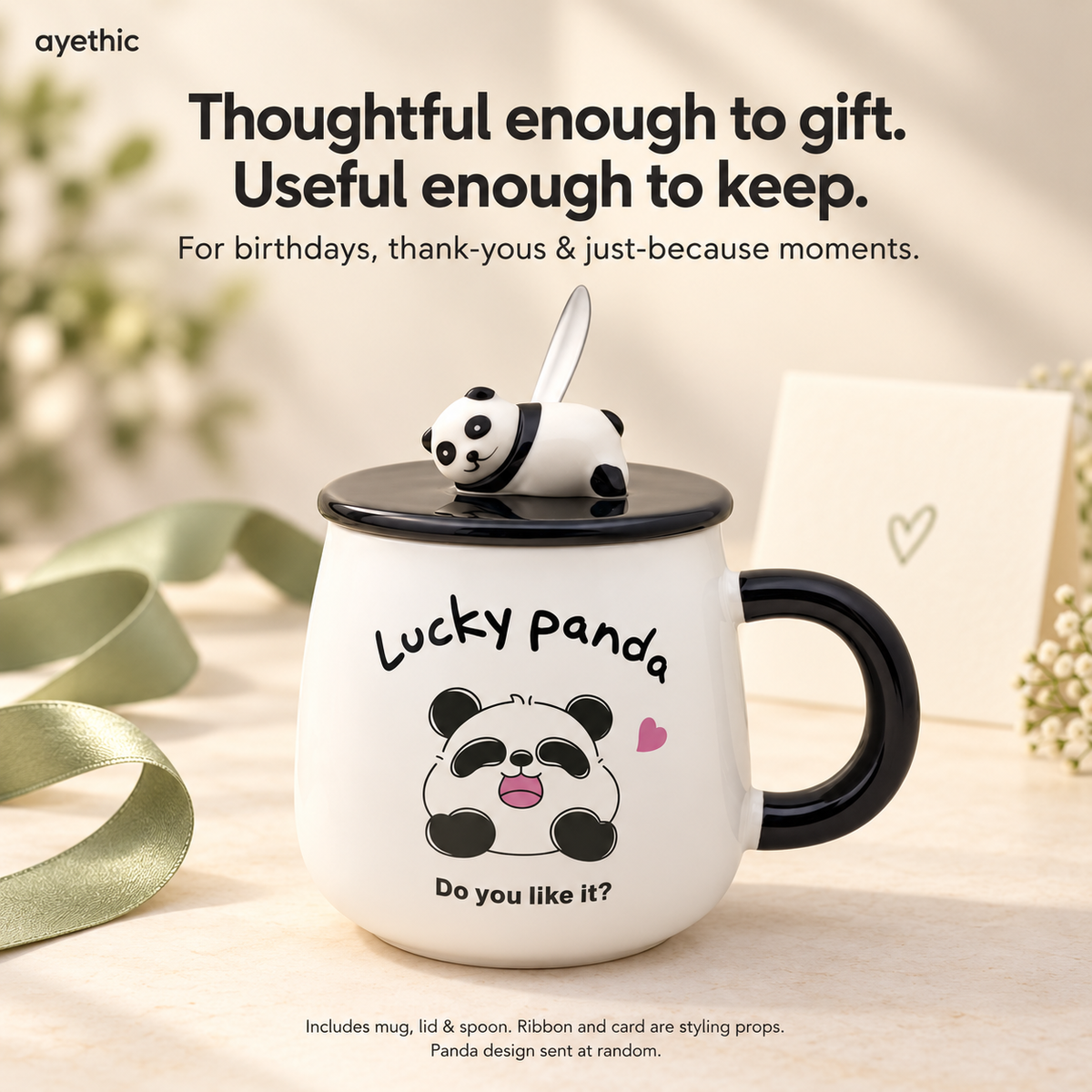 Fortune Panda mug as a thoughtful everyday gift. Includes mug, lid and spoon; ribbon and card are styling props.