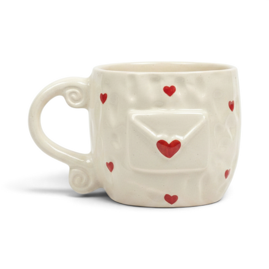Ayethic handcrafted ceramic mug in cream with hand-painted red hearts and a 3D envelope design