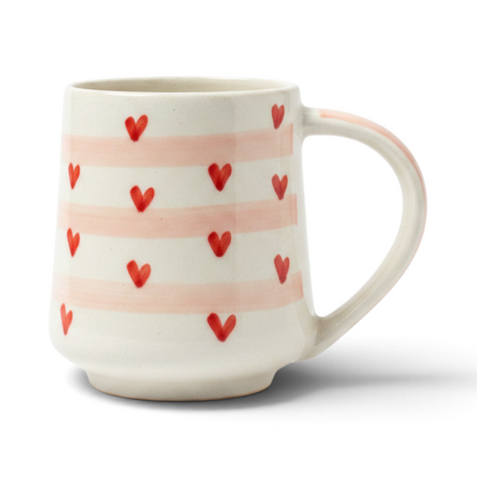 Ayethic handcrafted ceramic mug featuring hand-painted red hearts and soft pink stripes on a cream background