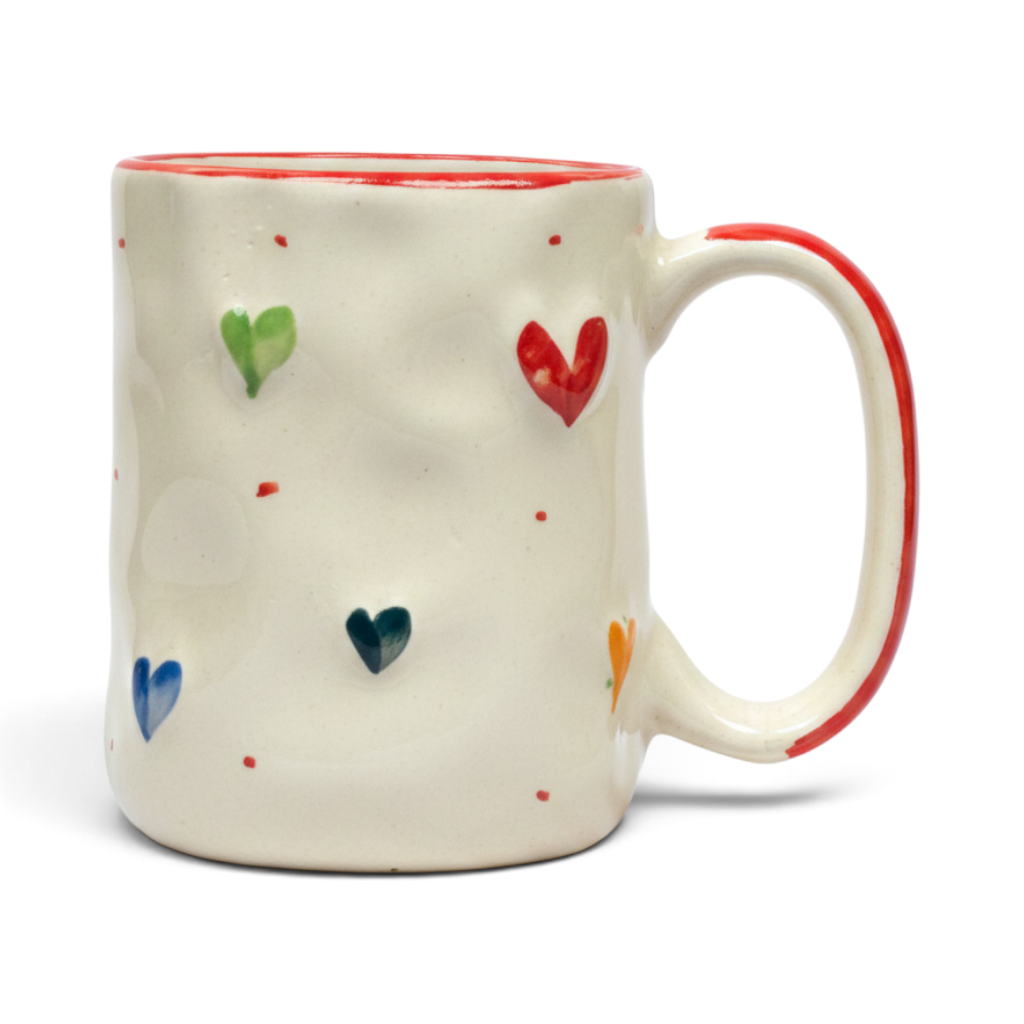 Ayethic handcrafted ceramic mug with cream textured body and small painted colorful hearts and red rim
