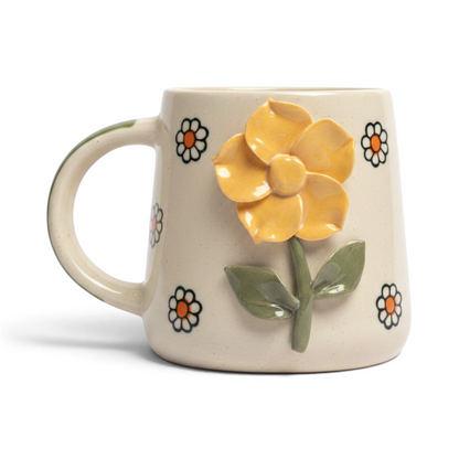 Ayethic handcrafted ceramic mug in cream with a 3D yellow flower and small painted daisies, microwave safe.